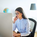 Serious businesswoman taking a mobile call